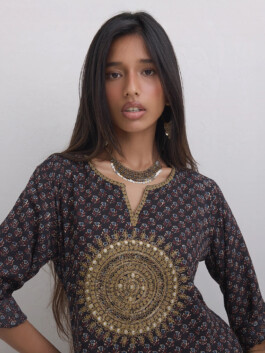 Model Dipannita Bhuyan from ALF modeling agency wearing a printed kurta with intricate gold embroidery for the Westside campaign. 