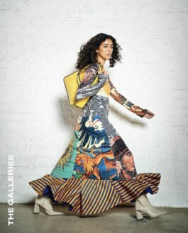 Medhavi Chettri walks in a vibrant printed dress and yellow handbag for The Galleries campaign 