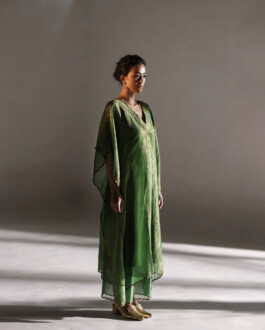 Medhavi Chettri wearing a green silk kaftan and palazzos for Mimamsaa campaign 