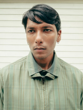 Gaurav Gharu close-up portrait in green shirt for Oshadi campaign, male model from A Little Fly (ALF) 