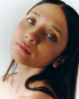 Close-up of Anushree Vaze with dewy skin and glossy eyeshadow for Dirty Magazine editorial 