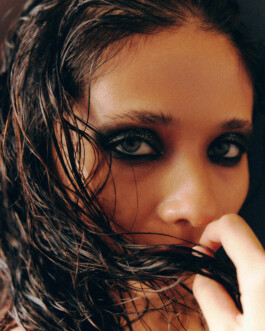 Close-up of Anushree Vaze with wet hair and dark smokey eye makeup for Dirty Magazine 