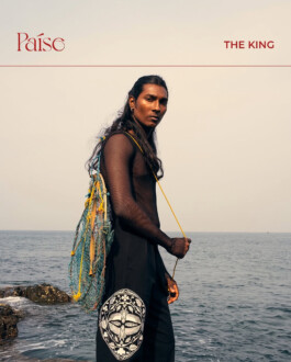 Model Savio Fedrick stands on rocky seashore in mesh top and black pants for Paise campaign titled 