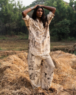 Model Savio Fedrick wearing printed co-ord set in an outdoor setting for Suket Dhir fashion campaign 