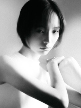 Black and white close-up portrait of model Tenzin Martha in a minimal editorial shoot for A Little Fly modeling agency, captured by Sameer Khatri 