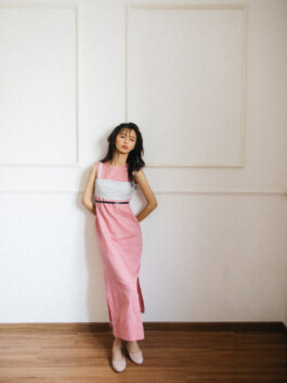 Model Tenzin Martha in a minimalist editorial wearing a pink and grey dress, photographed by Sameer Khatri for A Little Fly modeling agency 