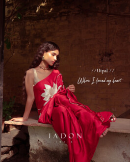 Deepika Sagar modeling a red lotus-embroidered saree for Jadon India campaign 