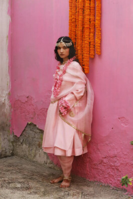 Model Deepika Sagar wearing a pastel pink traditional outfit for Aikeyah’s ethnic wear campaign 