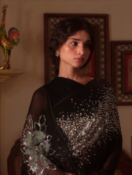 Model Deepika Sagar from ALF modeling agency wearing a black embellished saree with crystal detailing for the Jadon campaign photoshoot. 