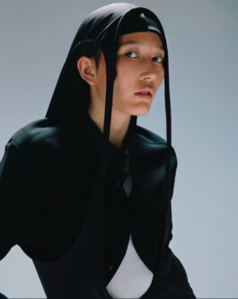 Ngawang Jinpa in a futuristic black headpiece and layered outfit for Bloni runway editorial 