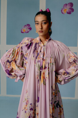 Akriti Jha close-up in lavender floral puff sleeve dress for Uri fashion campaign 
