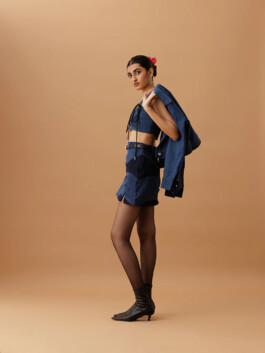 Yashvi Birla wearing a cropped denim top and mini skirt with black tights and boots for Ose Studios, represented by ALF modeling agency India 