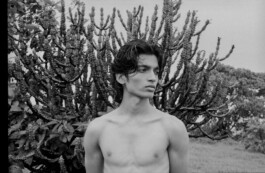 Aaditya Yadav, male model represented by A Little Fly (ALF India), editorial black and white photoshoot outdoors with cactus background 