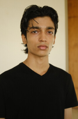 Aaditya Yadav’s clean digital portrait wearing a black T-shirt, represented by ALF – A Little Fly, one of the best modeling agencies in India. 