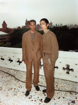 Aaditya Yadav and model in coordinated brown linen outfits on a Mumbai rooftop for Itoh fashion campaign 
