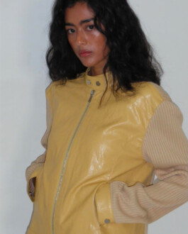 Medhavi Chettri in a mustard yellow faux leather bomber jacket with ribbed beige sleeves – Polysooem Lookbook 