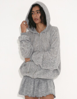 Medhavi Chettri wearing a textured grey hoodie and mini skirt with hood up – Polysooem Lookbook. Represented by ALF modeling agency India 