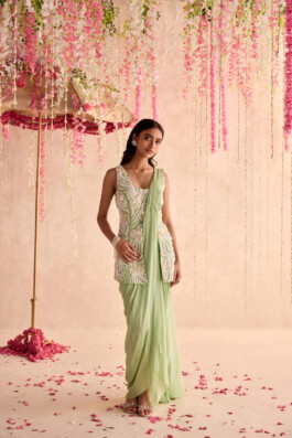 Model Dimple Aggarwal wearing pastel green embellished saree by Seema Thukral for a bridal lookbook shoot 