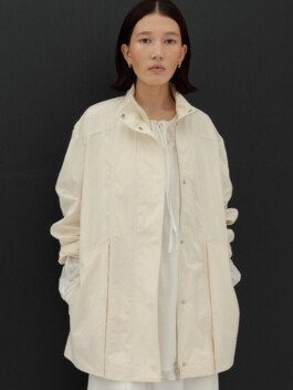 Ngawang Jinpa poses in a cream jacket and white outfit for Essential by EQL, represented by ALF modeling agency in India 