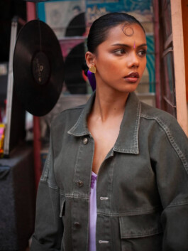 Ishra Philipose in green jacket and gold earrings for Wasala shoot 