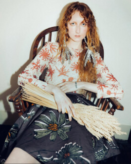 Model in mixed floral print outfit holding wheat for ROYLANCE campaign shot by photographer Tuhin Chandra 