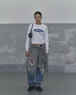 Ngawang Jinpa in Alfred SS25 lookbook wearing white Alfred cropped top, ripped jeans and layered shirt styling with Platinum Models Seoul, represented by A Little Fly modeling agency India 