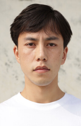 Close-up modeling digital of Tashi Gyatso showing his natural skin texture and facial features against a neutral background.