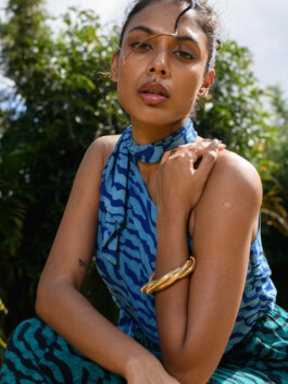 Shweta Poothery in a blue tiger print Elisamama outfit posing outdoors for the campaign 