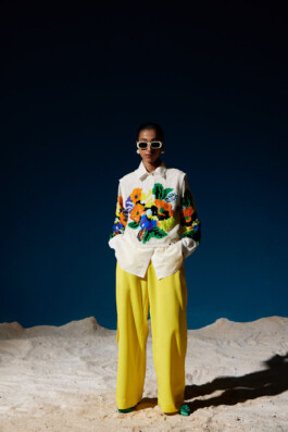 Model Akriti Jha wearing a floral sequined shirt with yellow trousers for Mohammed Mazhar campaign photoshoot 