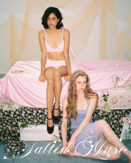 Model Medhavi Chettri sitting on a pastel pink bed in a soft minimal lingerie set for the Salted Muse campaign, photographed in a dreamy floral set design; represented by ALF India modeling agency. 